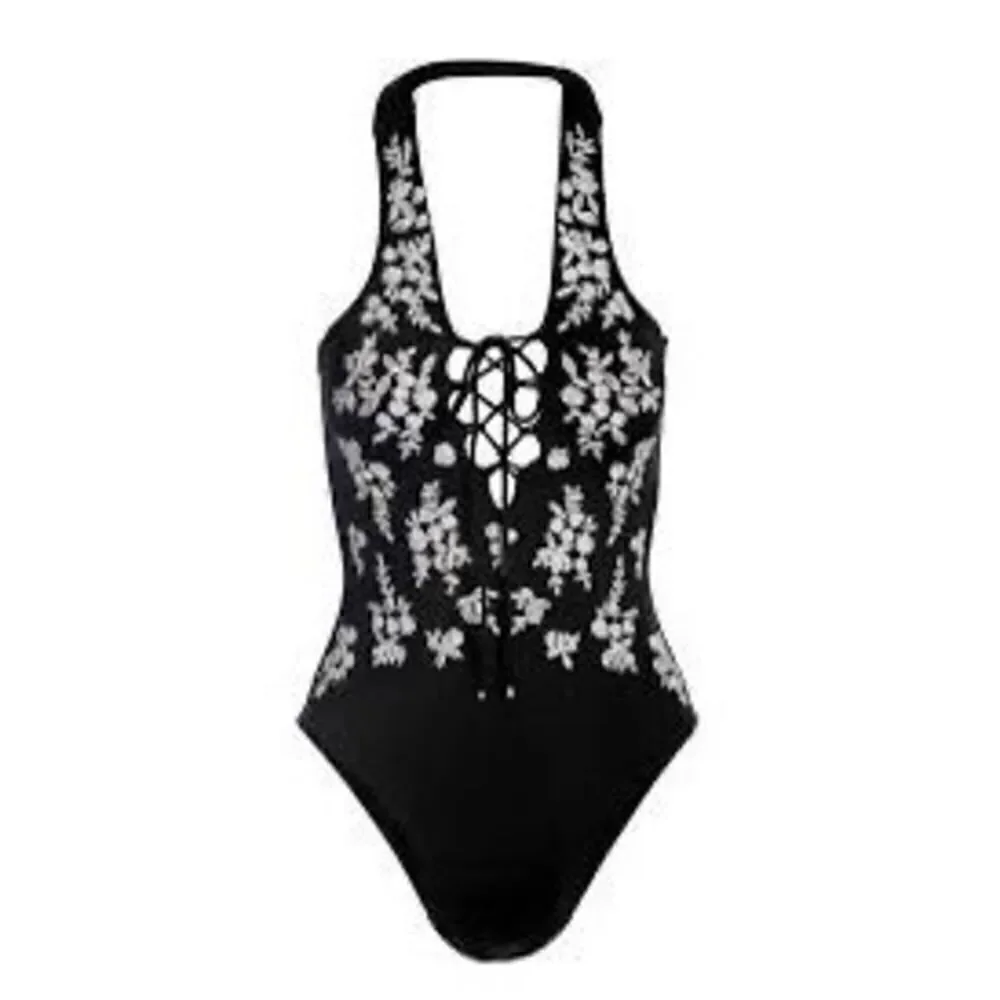 New. Boston Proper black embroidered one piece. Medium